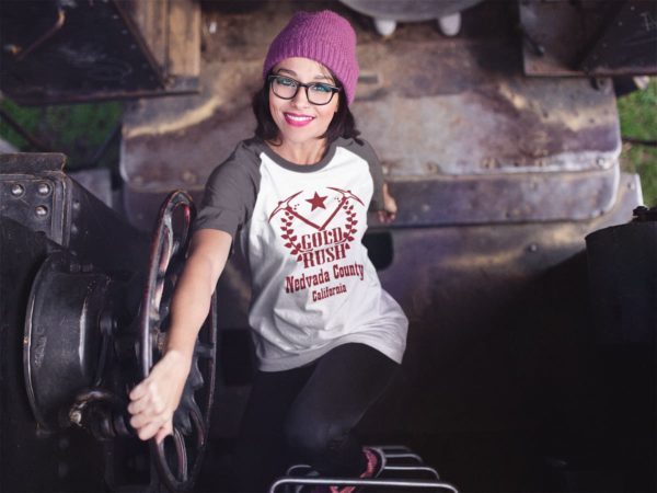 raglan-t-shirt-mockup-of-a-girl-climbing-up-a-train-ladder-Nevada County Gold Rush